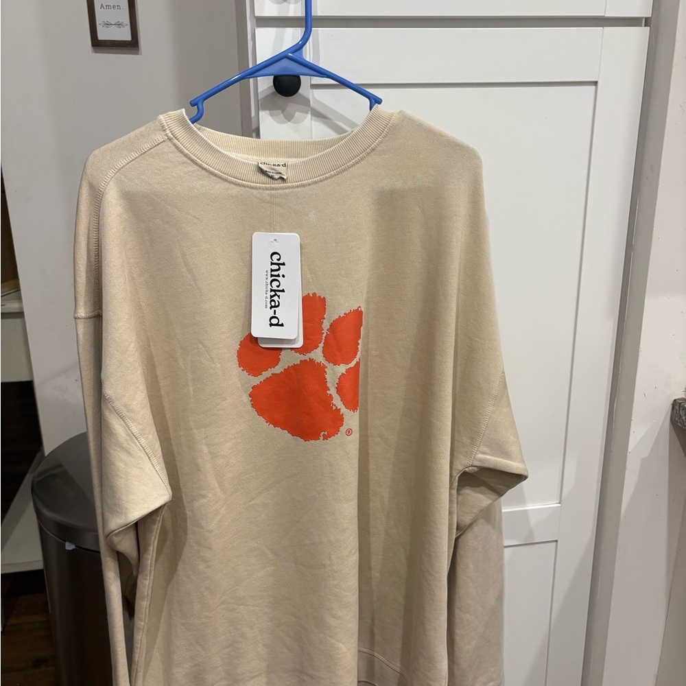 Chicka-d Cream Sweatshirt with Orange Logo